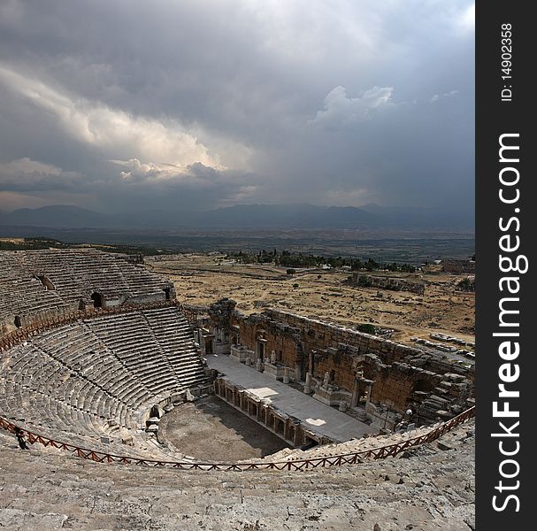 Theatre in Hierapolis (ancient Greek city)built about 62AD on the hill above thermal baths of Pamukkale. Theatre in Hierapolis (ancient Greek city)built about 62AD on the hill above thermal baths of Pamukkale.