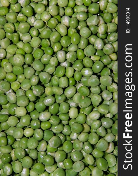 Many green peas. Their color attractive fresh.