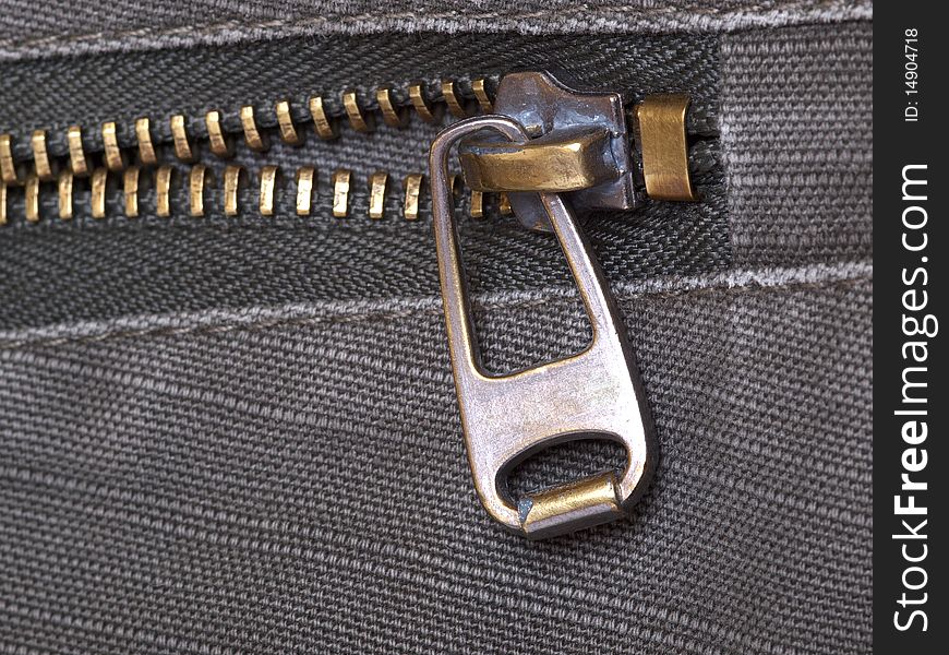 Color photo of metal zipper on jacket pocket