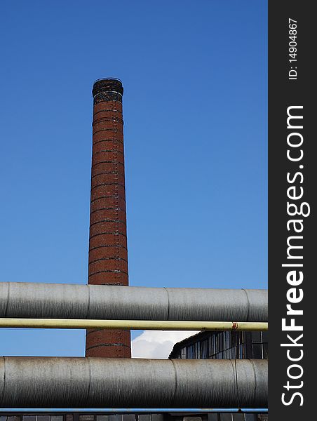 Building of antique factory with chimney. Building of antique factory with chimney