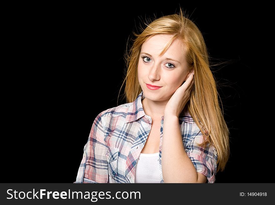 Young very attractive blond female, portrait, studio shoot isolated on black. Young very attractive blond female, portrait, studio shoot isolated on black