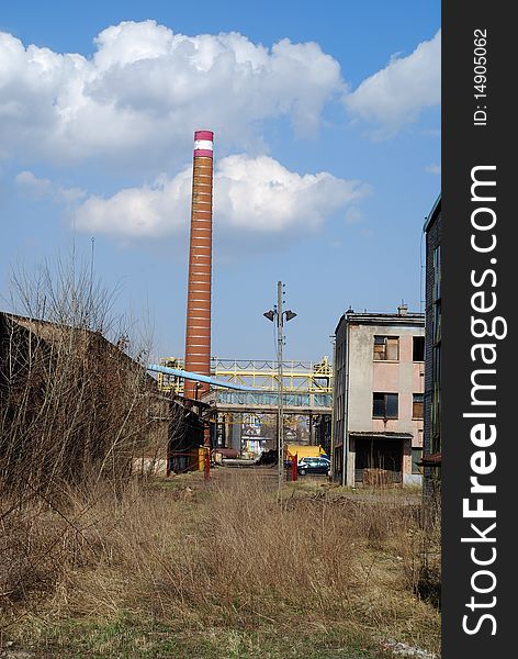 Building of antique factory with chimney. Building of antique factory with chimney