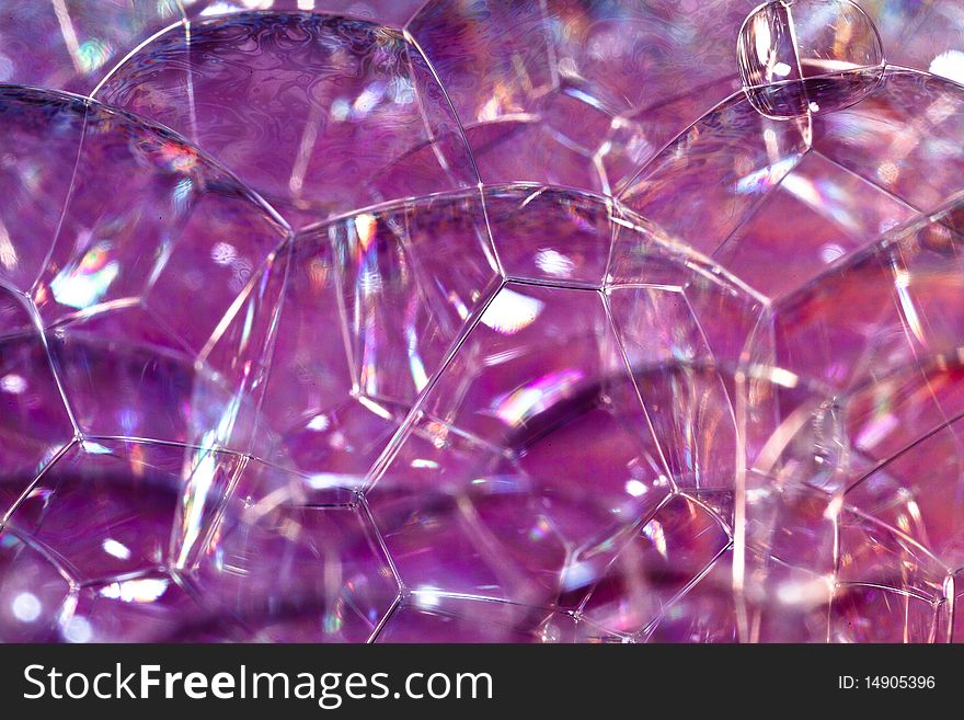 Closeup Soap Bubbles in colored background