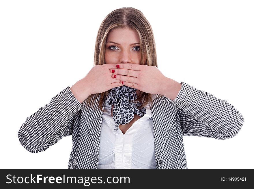 Closeup of young professional women covering her mouth with both hands over isolated white background