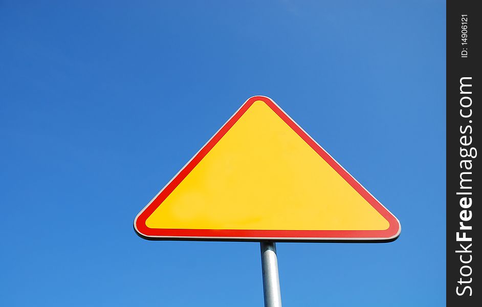 Road sign on the blue sky