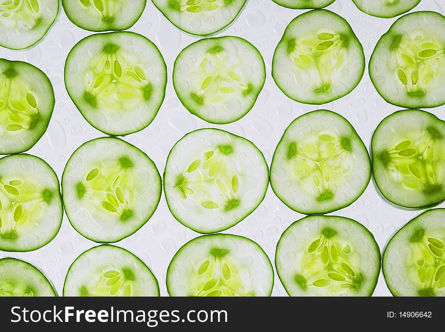 Background with green sweet cucumber. Background with green sweet cucumber