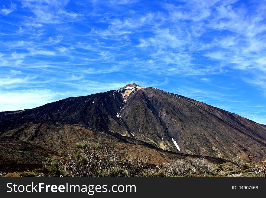 Magnificent feather clouds over Teide volcano