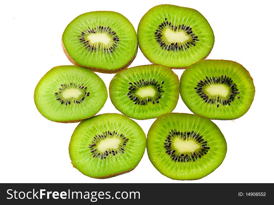 Green sliced kiwi isolated on white