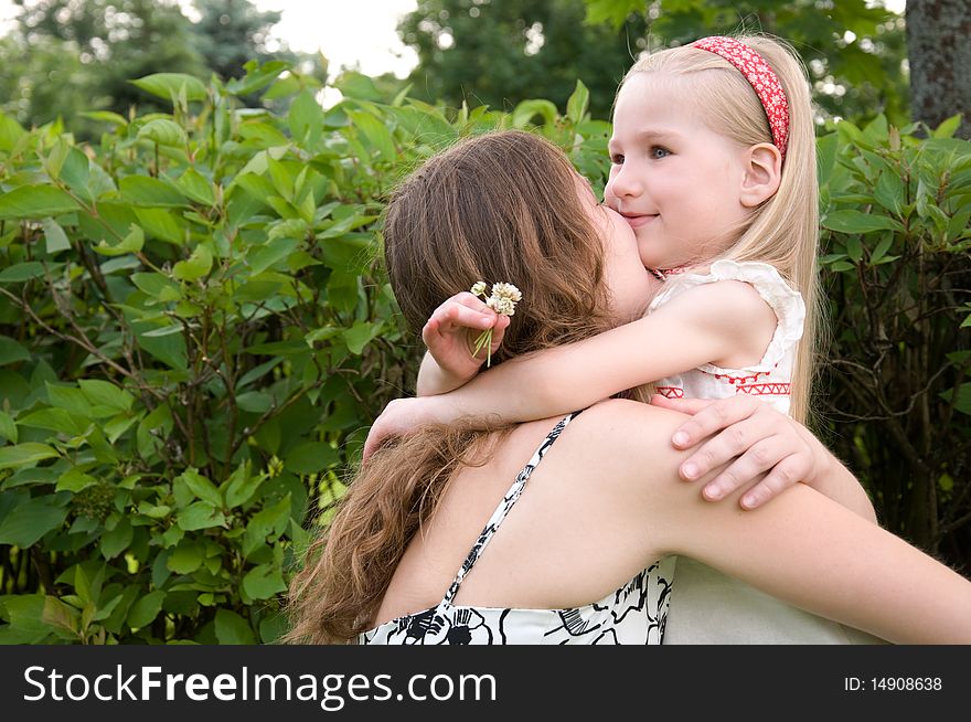 Embrace of mother and daughter. Embrace of mother and daughter
