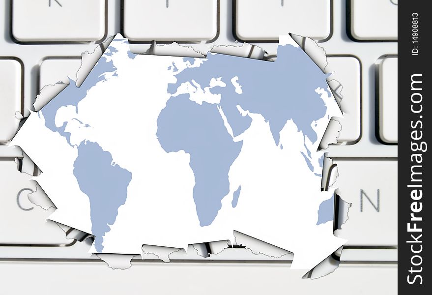 Conceptual image showing torn keyboard revealling map of world. Conceptual image showing torn keyboard revealling map of world