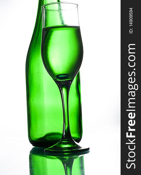 Green bottle and glass