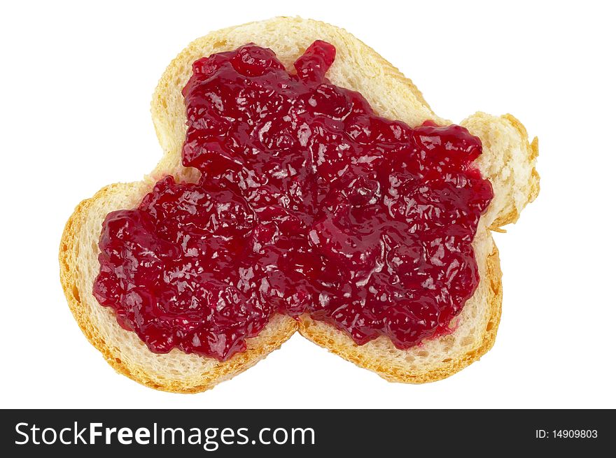 Cowberries jam on the white bread  macro shot isolated over whtie background. Cowberries jam on the white bread  macro shot isolated over whtie background