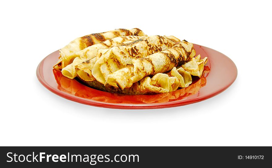 Fresh rolled pancakes on plate