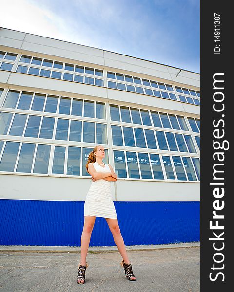 Girl Posing Over Old Factory