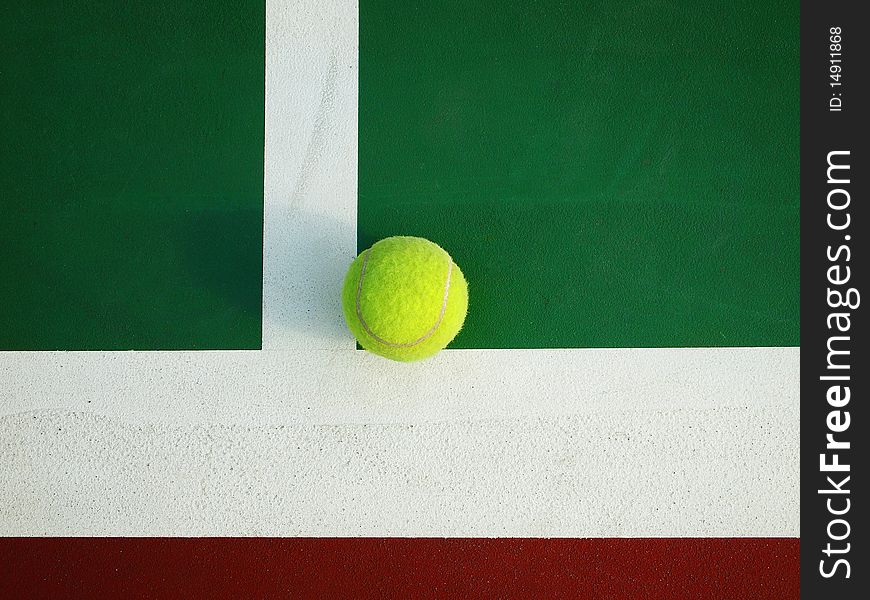 Tennis ball on the Corner of tennis court