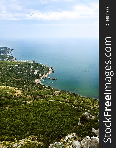 Crimean coastline, black sea surface under the summer sky