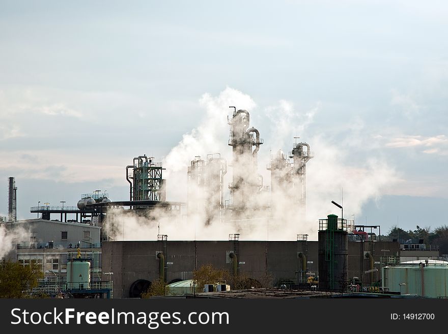 Chemical plant with dust and smoke