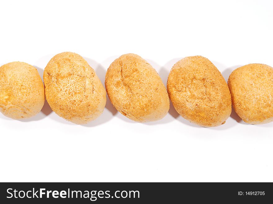 Five fresh buns over white background. Five fresh buns over white background