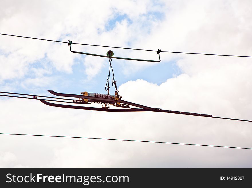 Railway wire of the high tension line with sky