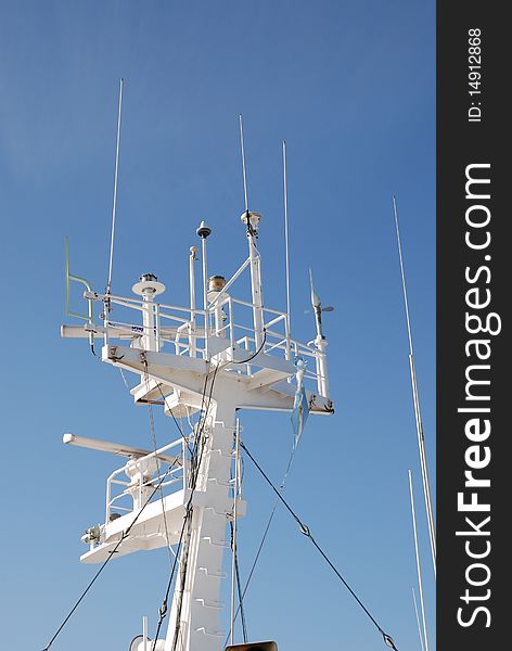 Ship's navigation instruments mounted on top of iron tower. Ship's navigation instruments mounted on top of iron tower