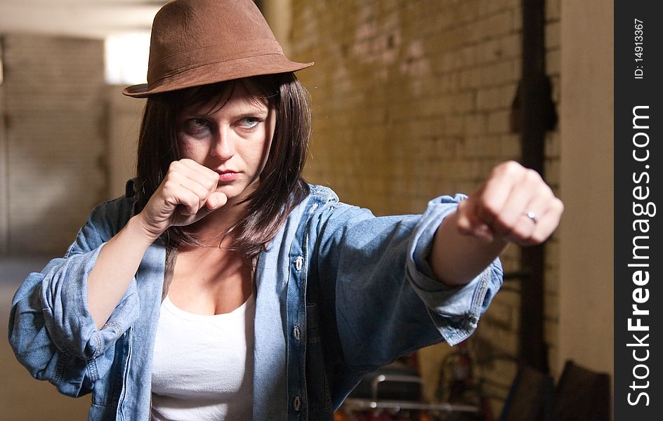 Attractive Girl Throwing A Punch