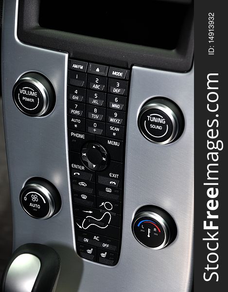 Advanced operation panel with abunant push button and knob of sedan, shown as functional, luxury and technology. Advanced operation panel with abunant push button and knob of sedan, shown as functional, luxury and technology.