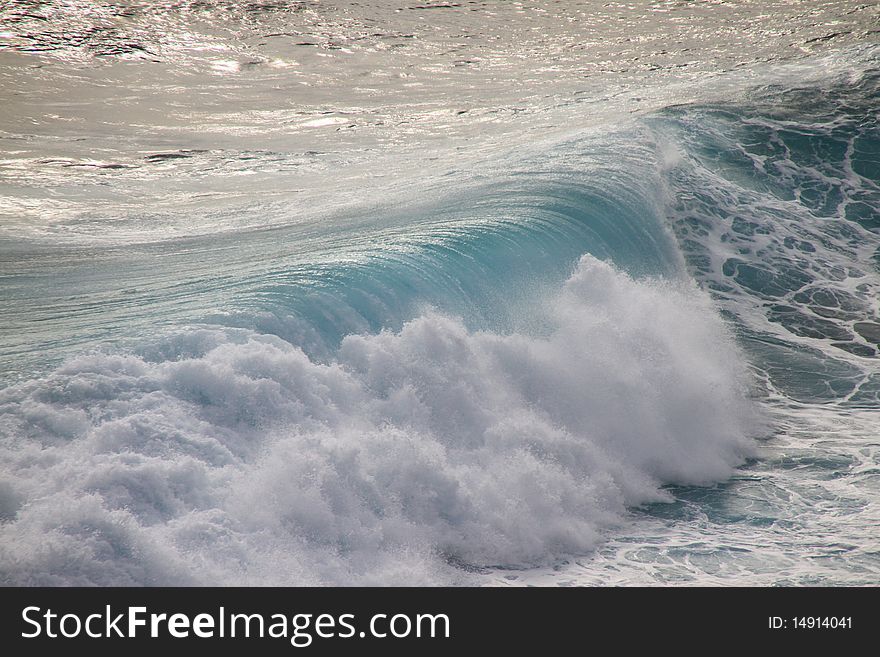 Huge dark green breaking wave and surf. Huge dark green breaking wave and surf