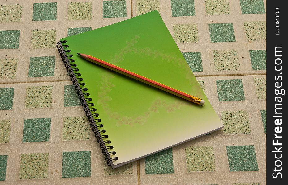 Note Book And Pencil