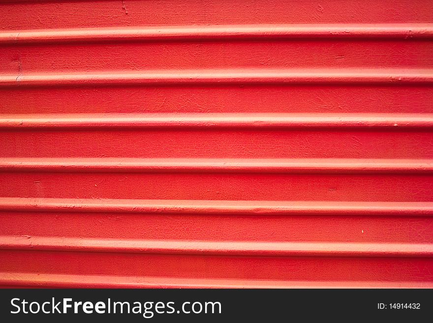 Red wall on the side of the train, parking in the resort