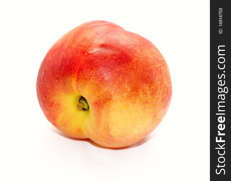 Full peach isolated on white background