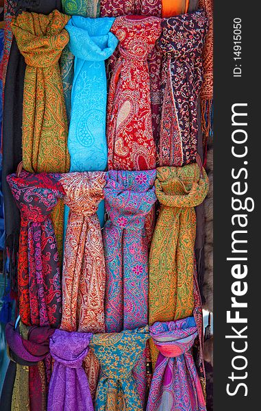 Multi-coloured scarfs on the market