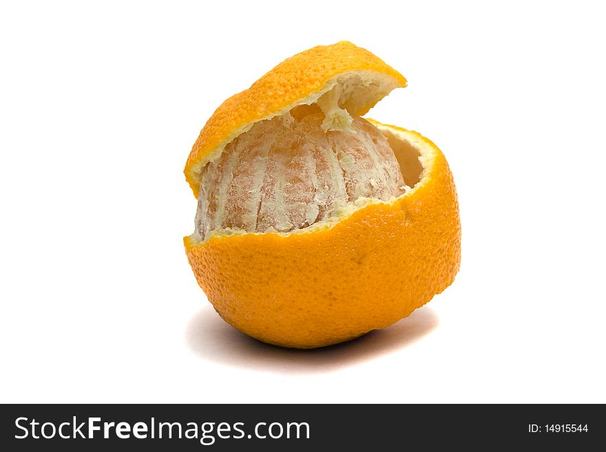 Round orange with which partially clear away rind. Round orange with which partially clear away rind