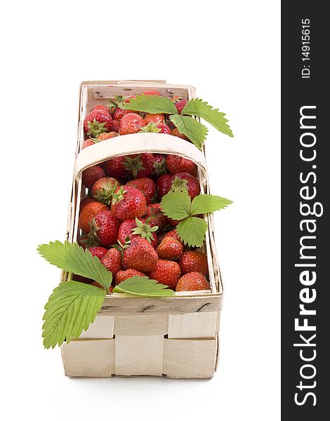 Fresh juicy strawberries in wooden basket isolated on white. Fresh juicy strawberries in wooden basket isolated on white