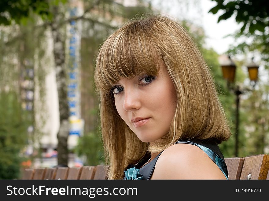 Beautiful young woman in park