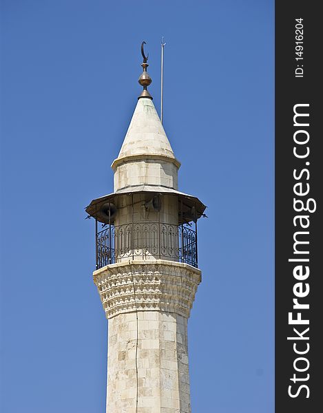 White MInareet of a mosque in down tow beirut. White MInareet of a mosque in down tow beirut