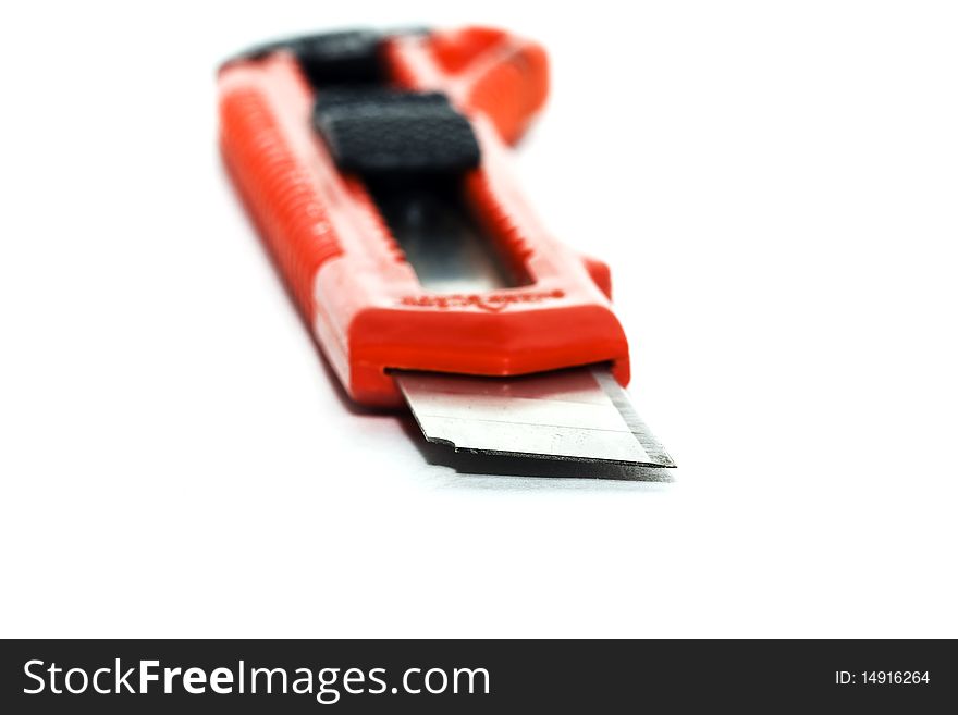 Photo a red knife for are sharp of any paper. Photo a red knife for are sharp of any paper