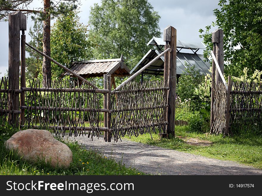 The fence in a Russian village folk wood art