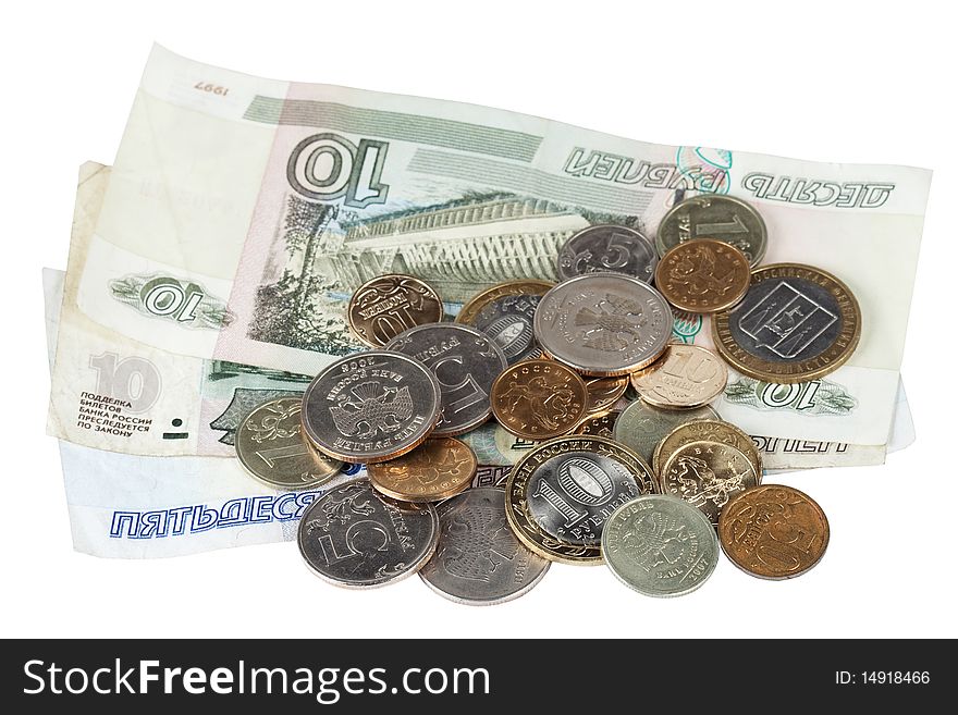 Pile of the paper banknotes and coins is insulated on white background