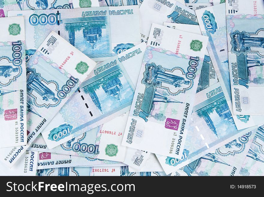 Background from money banknotes by nominal value thousand roubles
