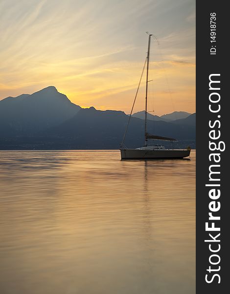 A boat at sunset on Lake Garda. A boat at sunset on Lake Garda