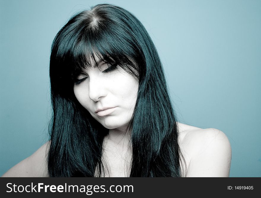 Woman's portrait in bluish light