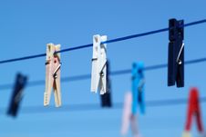 Cloth Pegs With A Under The Blue Sky Stock Photo