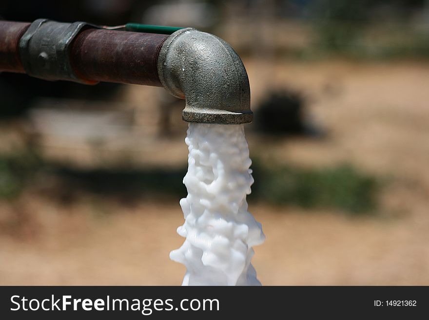 The water pipe which is connected to the pump swinging a foamy liquid.