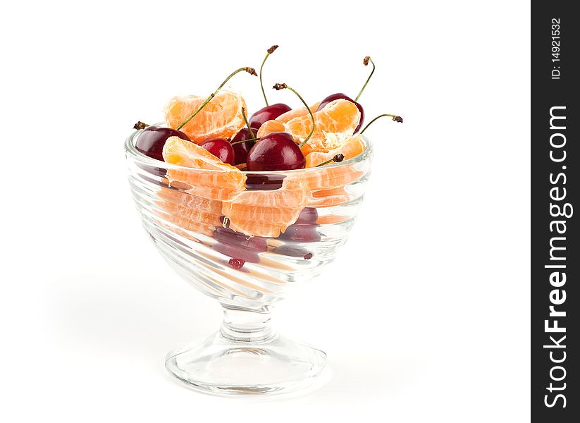 Fresh fruits and cherries isolated on a white background