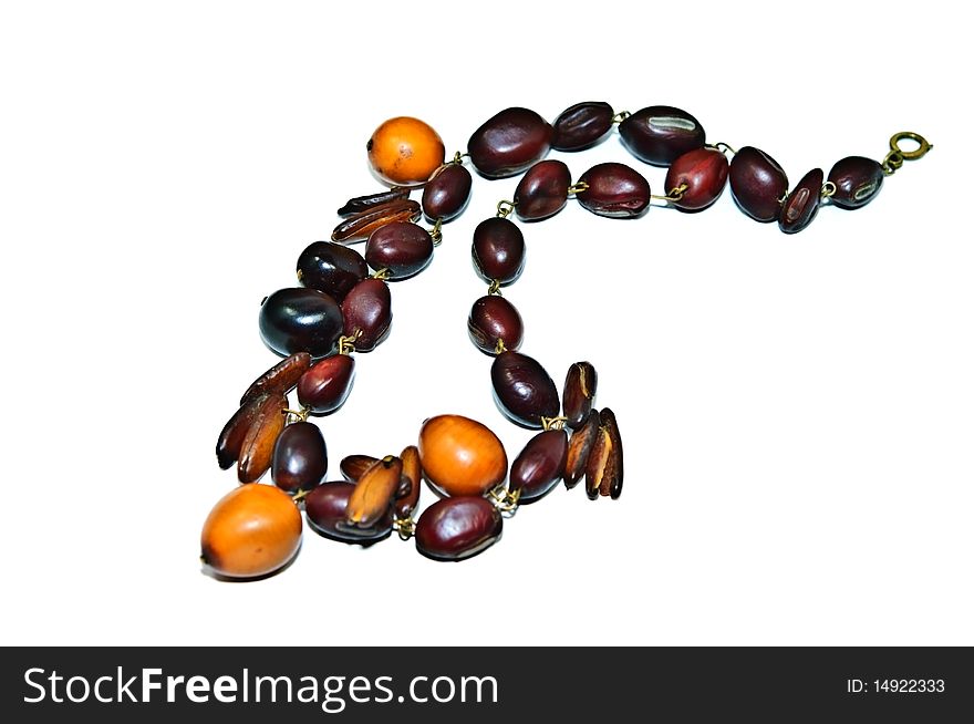 A handmade, wooden, necklace made of real beads. A handmade, wooden, necklace made of real beads.