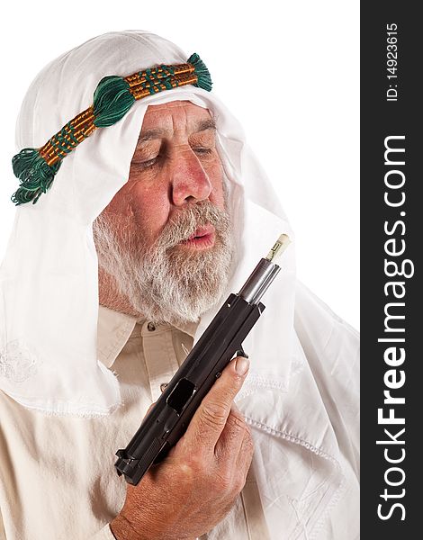 Arab Man Blowing On Money Stuffed In A Gun