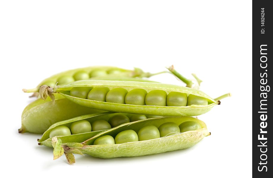 Green peas on a white background