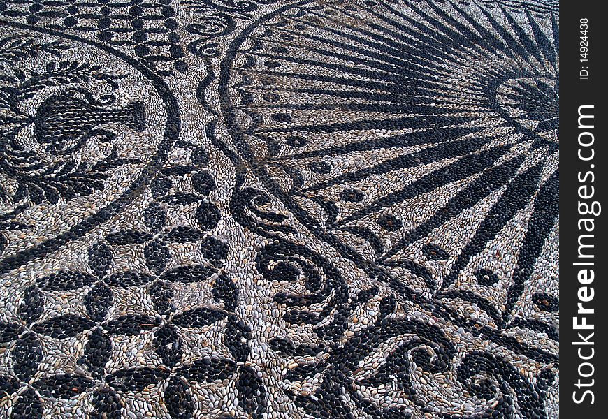 Stone pattern with black and white stones in Xios (greece). Stone pattern with black and white stones in Xios (greece)