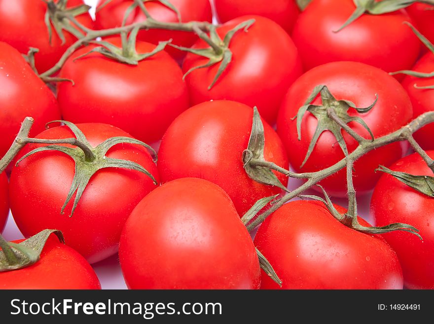 Selective focus tomatos group full frame background. Selective focus tomatos group full frame background