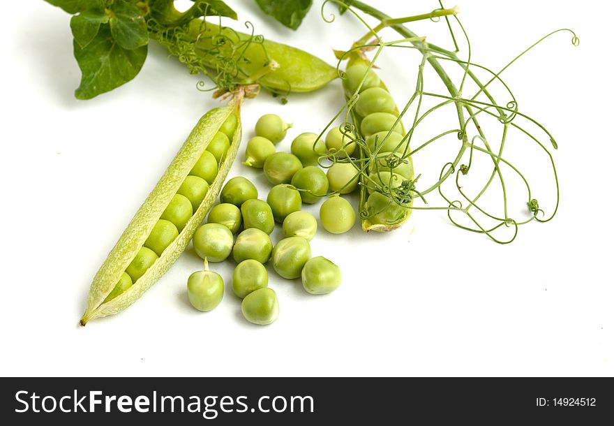 Green peas pods on a white background